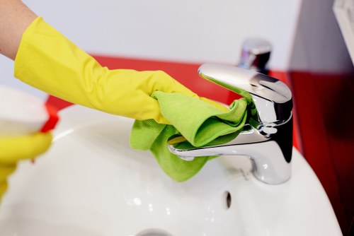 Cleaning technician applying carpet care products with caution